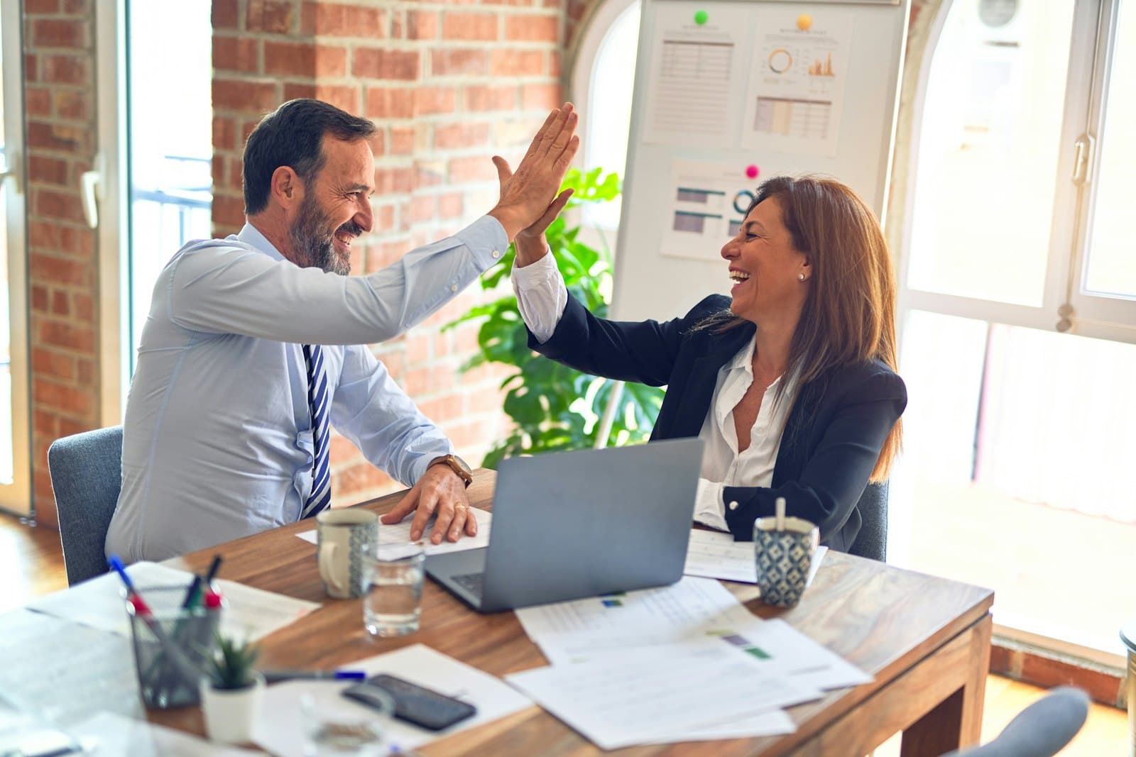 A team reviewing financial plans together at a table